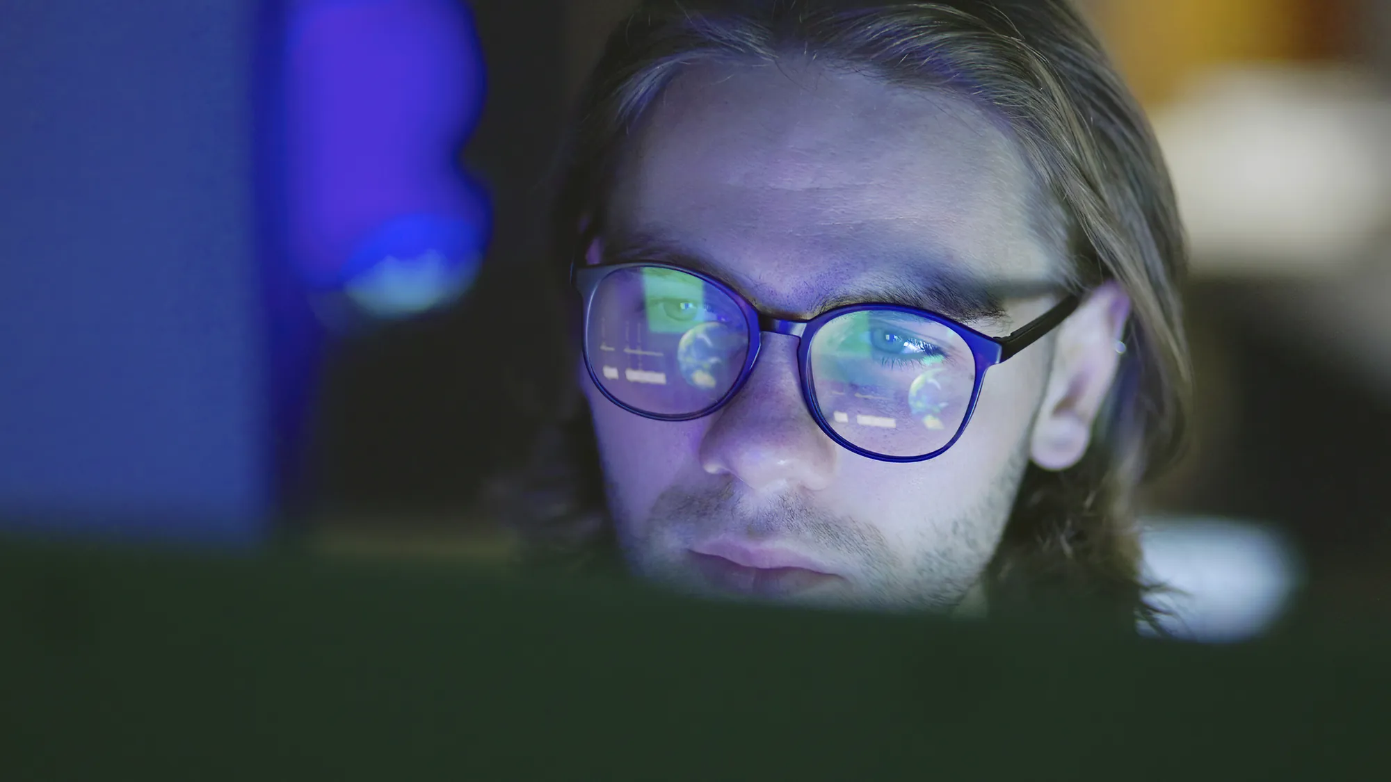 Scientist reviewing scientific data on screen