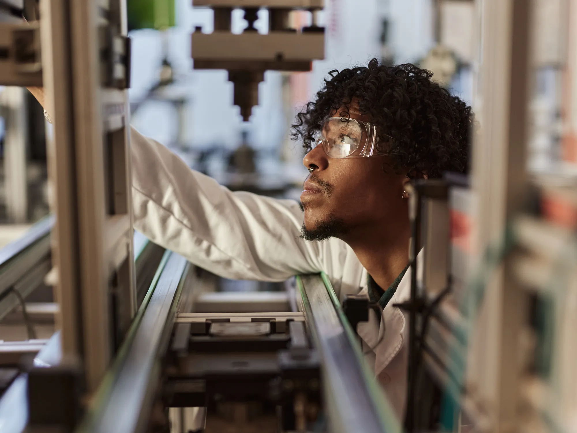 Engineer working on automated test equipment
