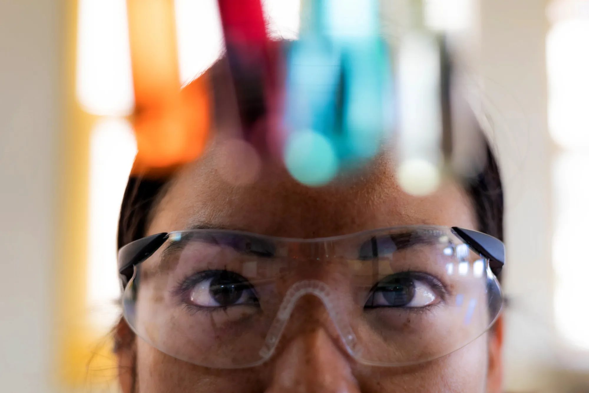 Scientist examining a sample in a laboratory