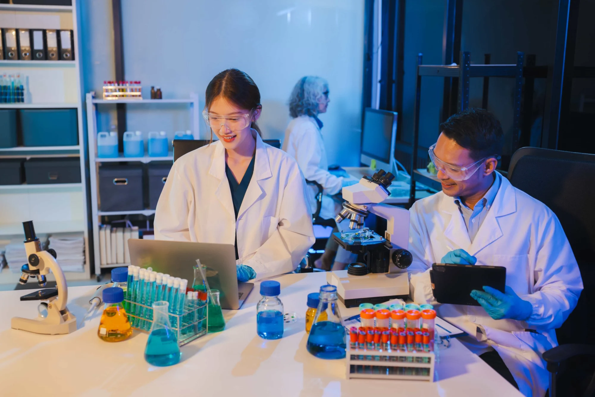 Scientist mixing liquids in a laboratory